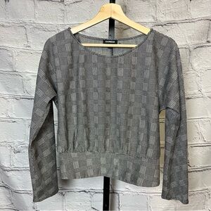 Express plaid long sleeve shirt. Black and white.  Slight synch on back